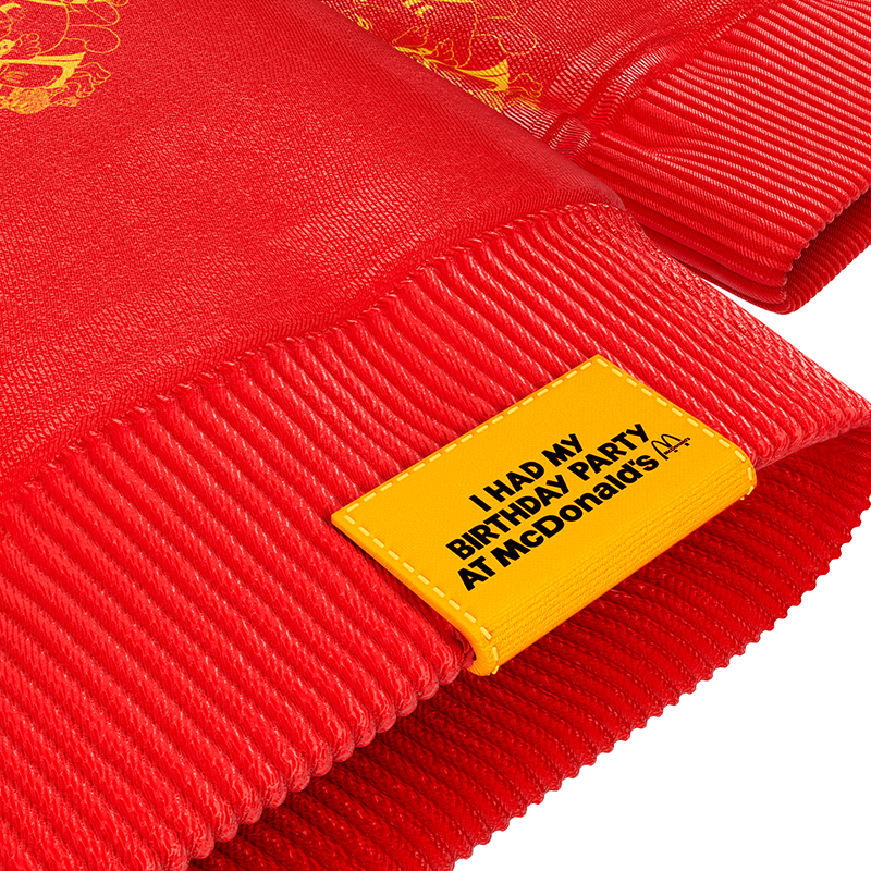 Yellow woven Sweatshirt tag with I had my Birthday Party at McDonald's text