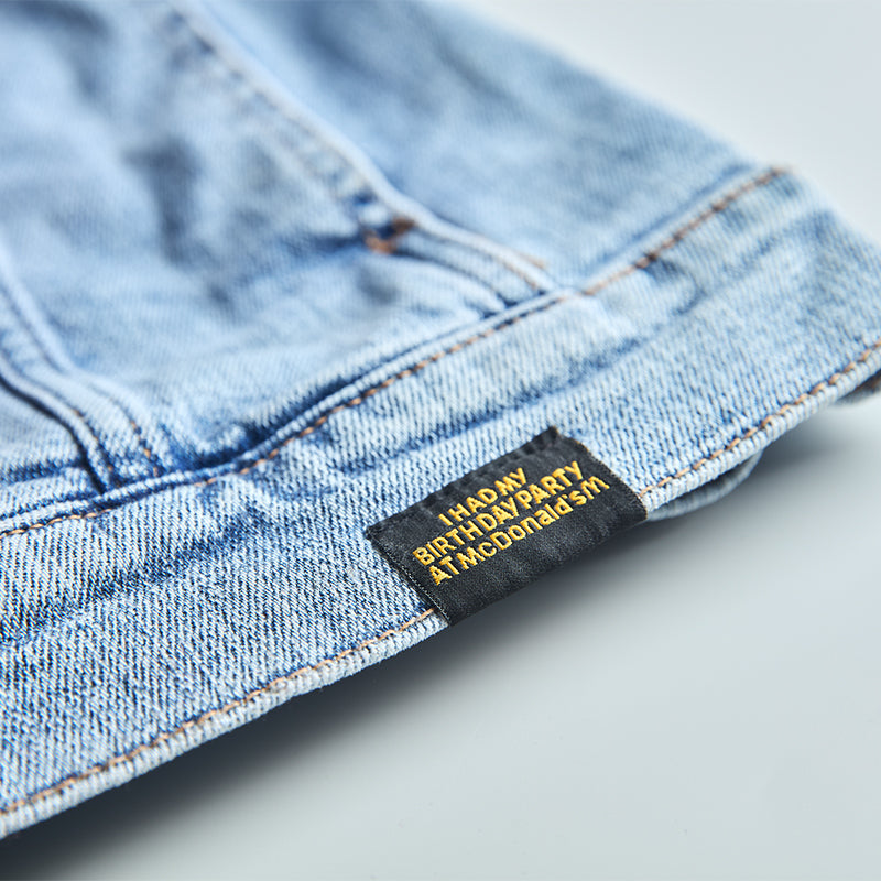Black woven tag with I had my Birthday Party at McDonald's text