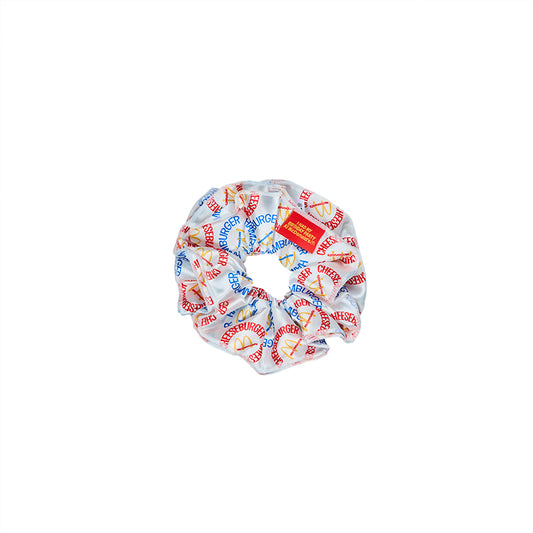 White scrunchie with printed hamburger and cheeseburger pattern